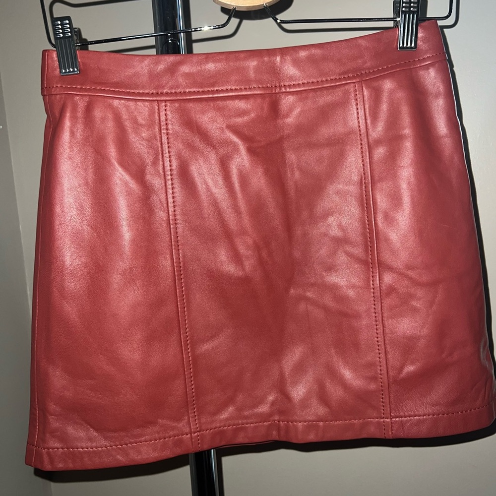 Faux leather skirts in navy and red!